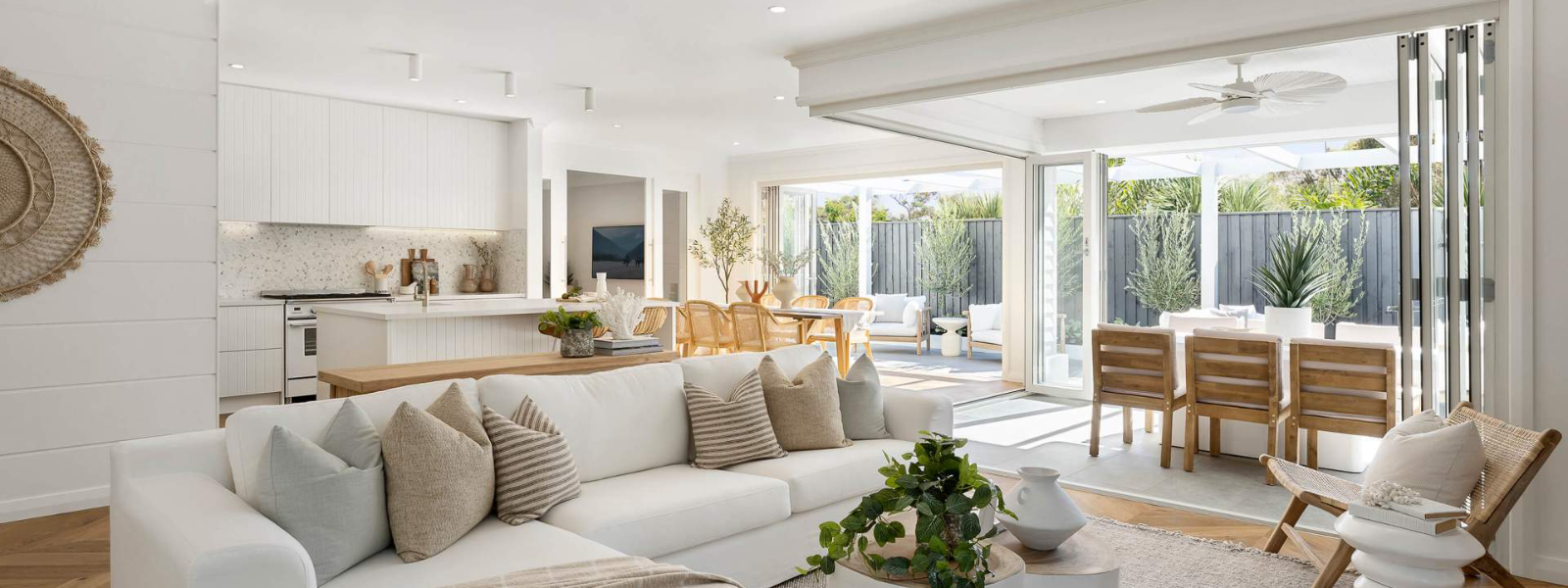 Discover the benefits of open concept living and learn how to seamlessly integrate different areas of your home to create a spacious and inviting living room.