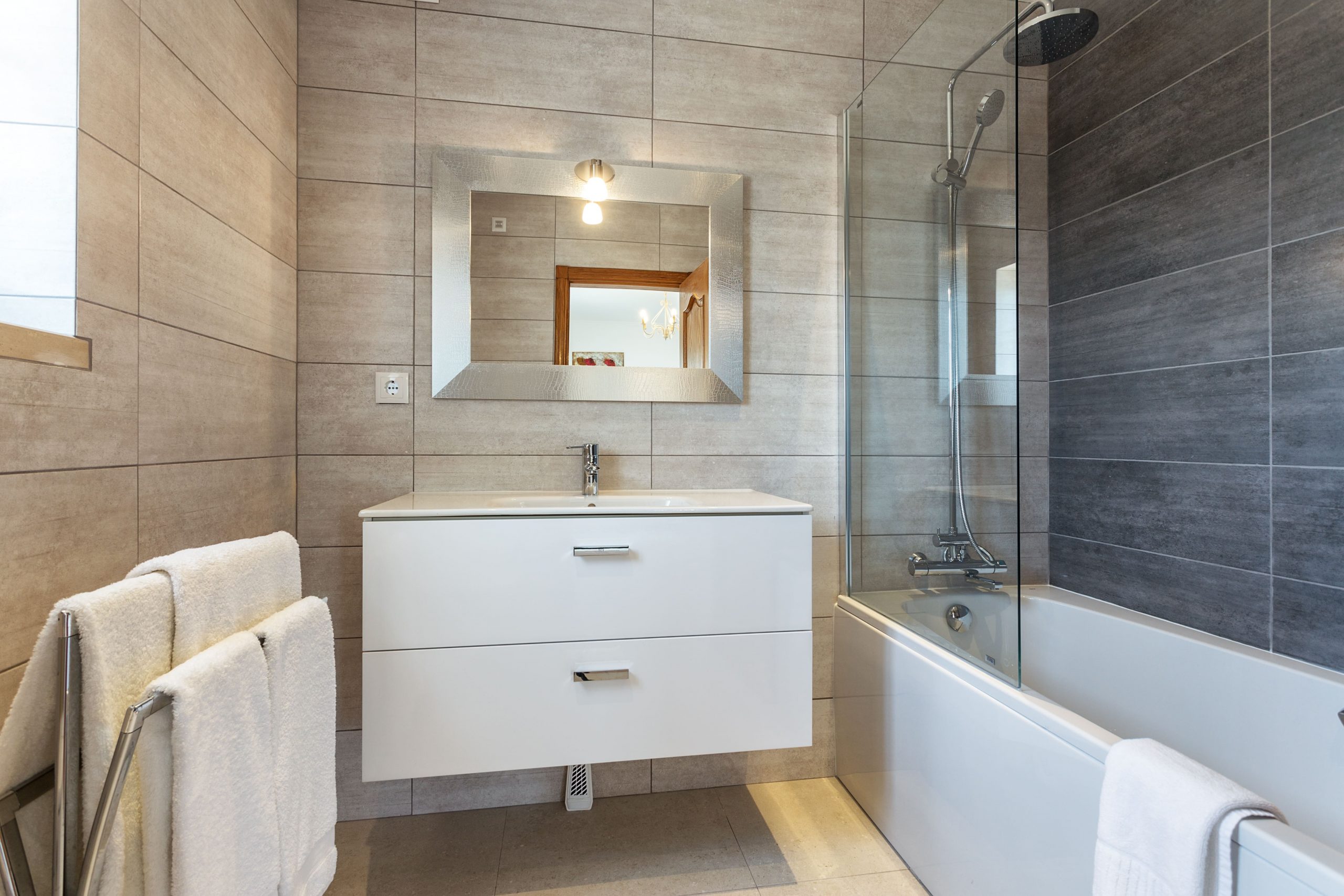 Create a Showstopping Bathroom: Unleash the Power of Modern Tile Designs