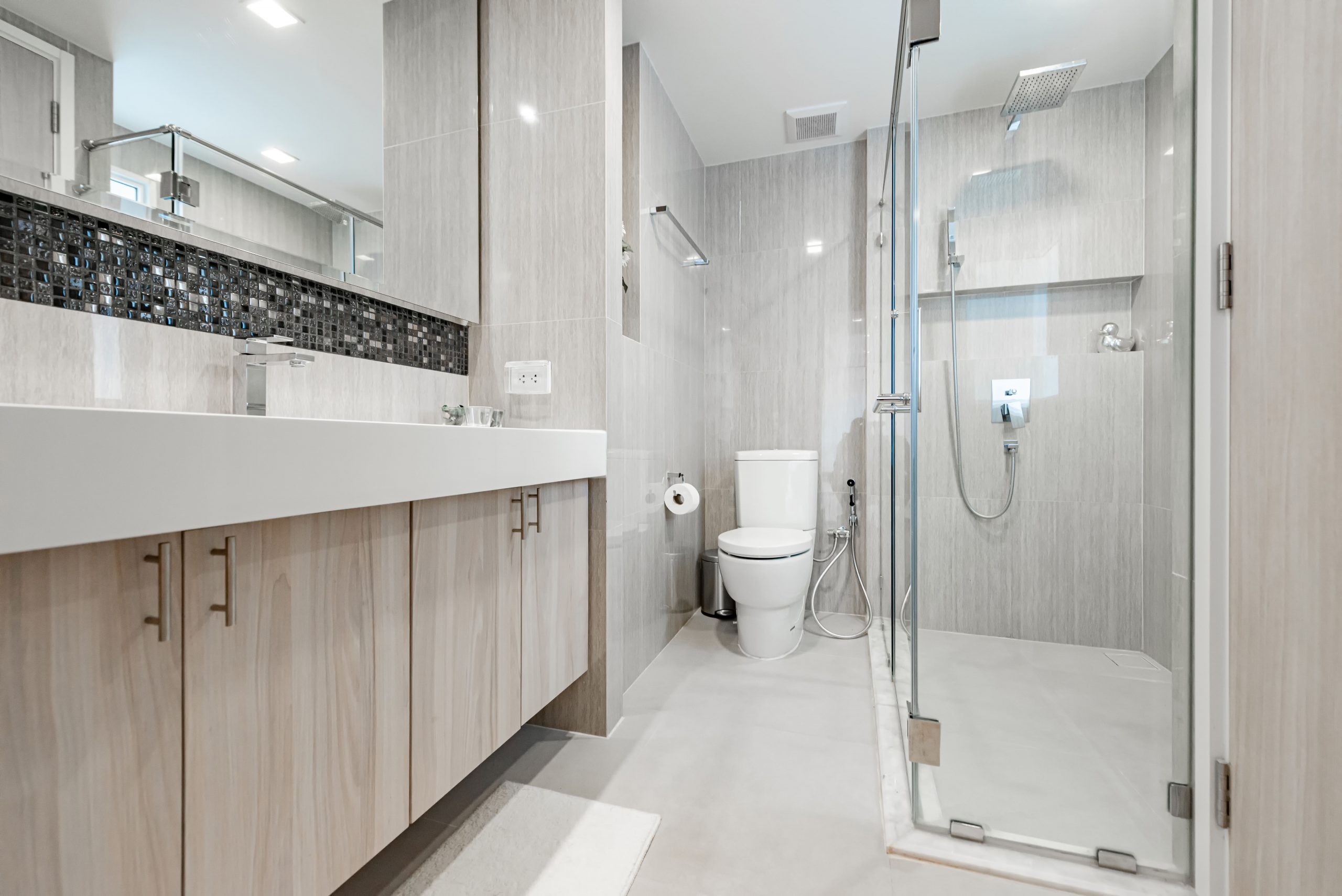 Lack of storage in a bathroom can lead to a multitude of problems. Without proper storage solutions, your bathroom can quickly become cluttered and disorganized, making it difficult to find and access essential items. Not only does this create a chaotic and messy environment, but it also hinders your ability to efficiently use the space.